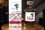 Hibiki Blossom Harmony bottle in its pastel-colored gift box featuring sakura motifs