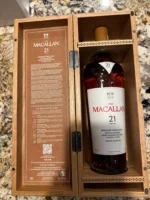 Macallan 21 Year Old in luxury gift box with Colour Collection branding and Macallan crest