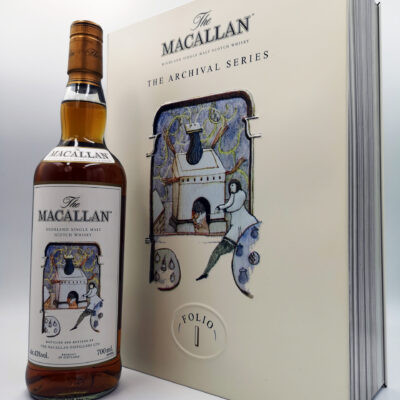 Macallan Folio 1 in its book-inspired black gift box with gold calligraphy, travel retail exclusive