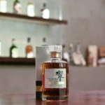 Hibiki Mellow Harmony bottle in its light-toned gift box with subtle gold accents