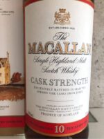 The Macallan Cask Strength Old Edition 1990s bottling with green glass and minimalist label, 700ml, 58.5% ABV