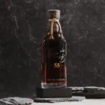 The Yamazaki 55 Year Old crystal decanter with deep amber liquid, 700ml, 43.5% ABV